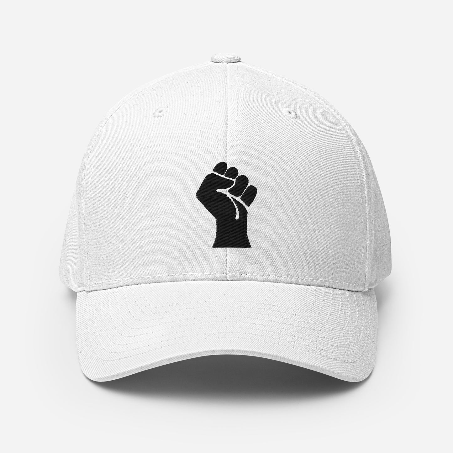 White Flexfit structured cap with bold black embroidered power fist, offering clean contrast and cultural pride by TheBlackest Co.