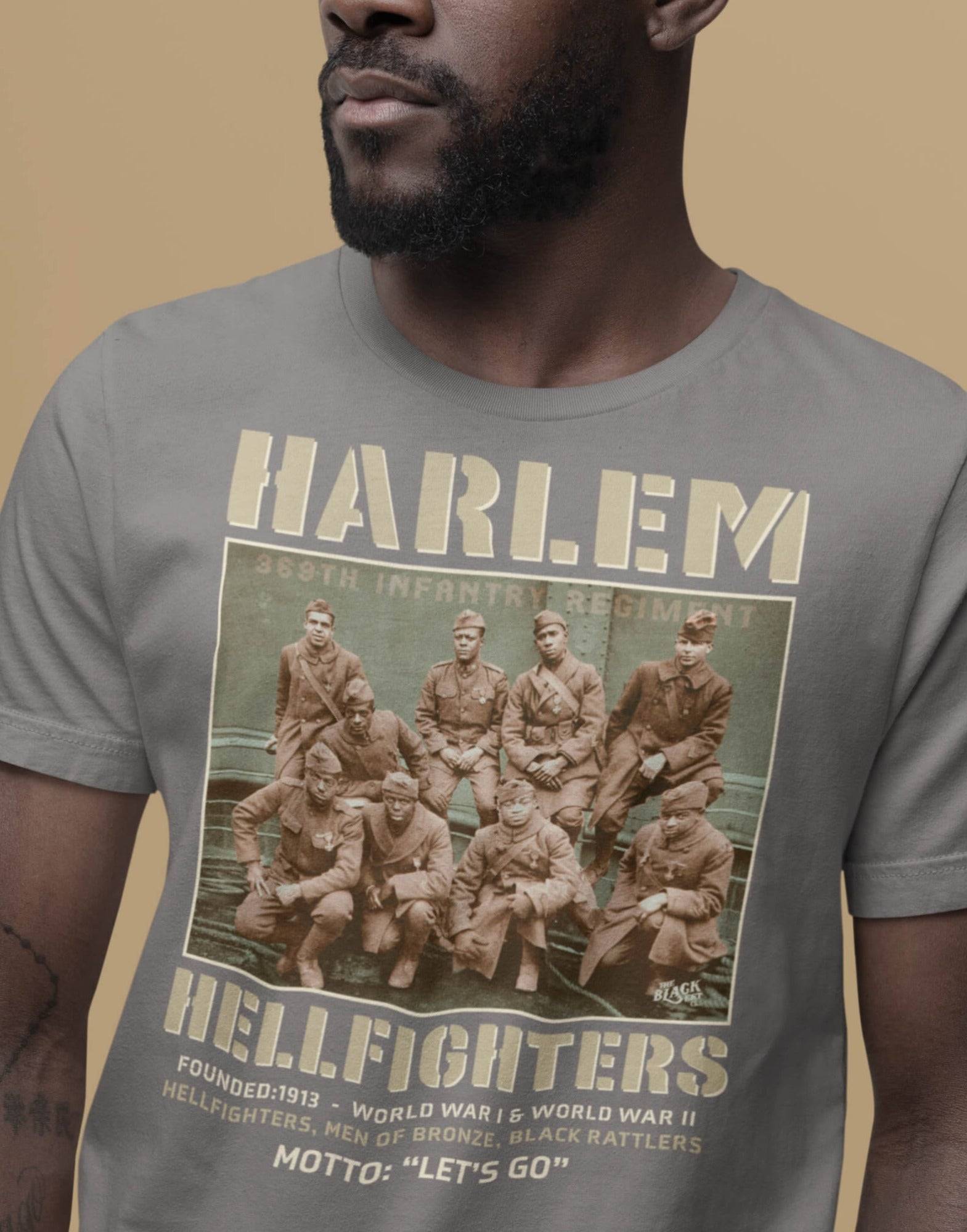 man wearing a grey t shirt with an image of the harlem hellfighters graphic design
