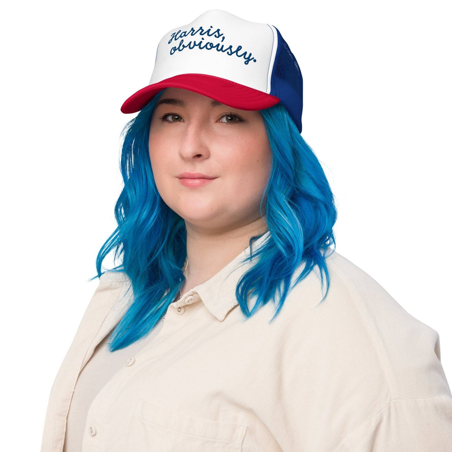 Woman wearing red and blue Harris Obviously retro trucker hat