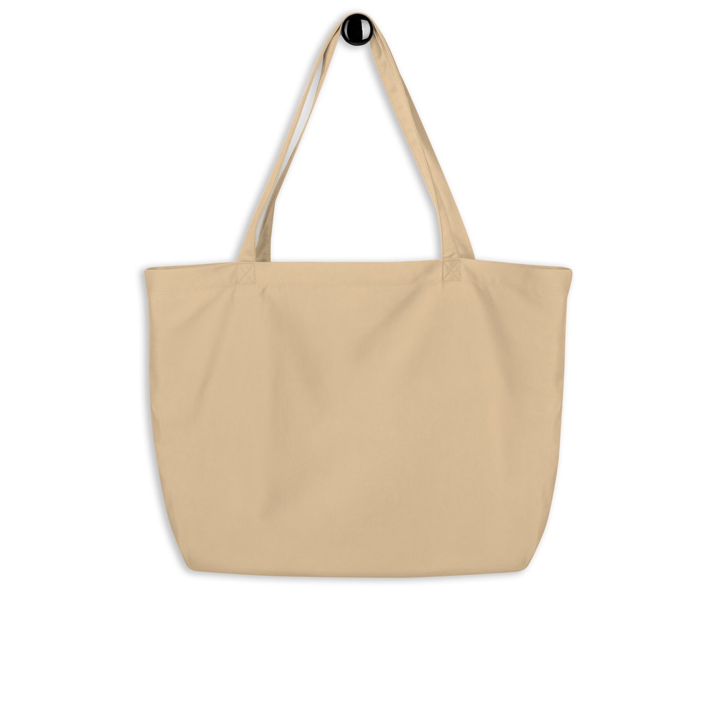Close-up of beige tote bag with black logo and text