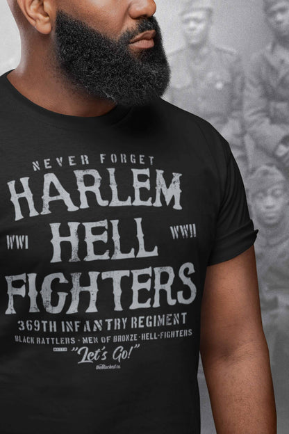 man with beard black t shirt with white text that reads harlem hellfighters wwi and wwii with a vintage soldier image in the background