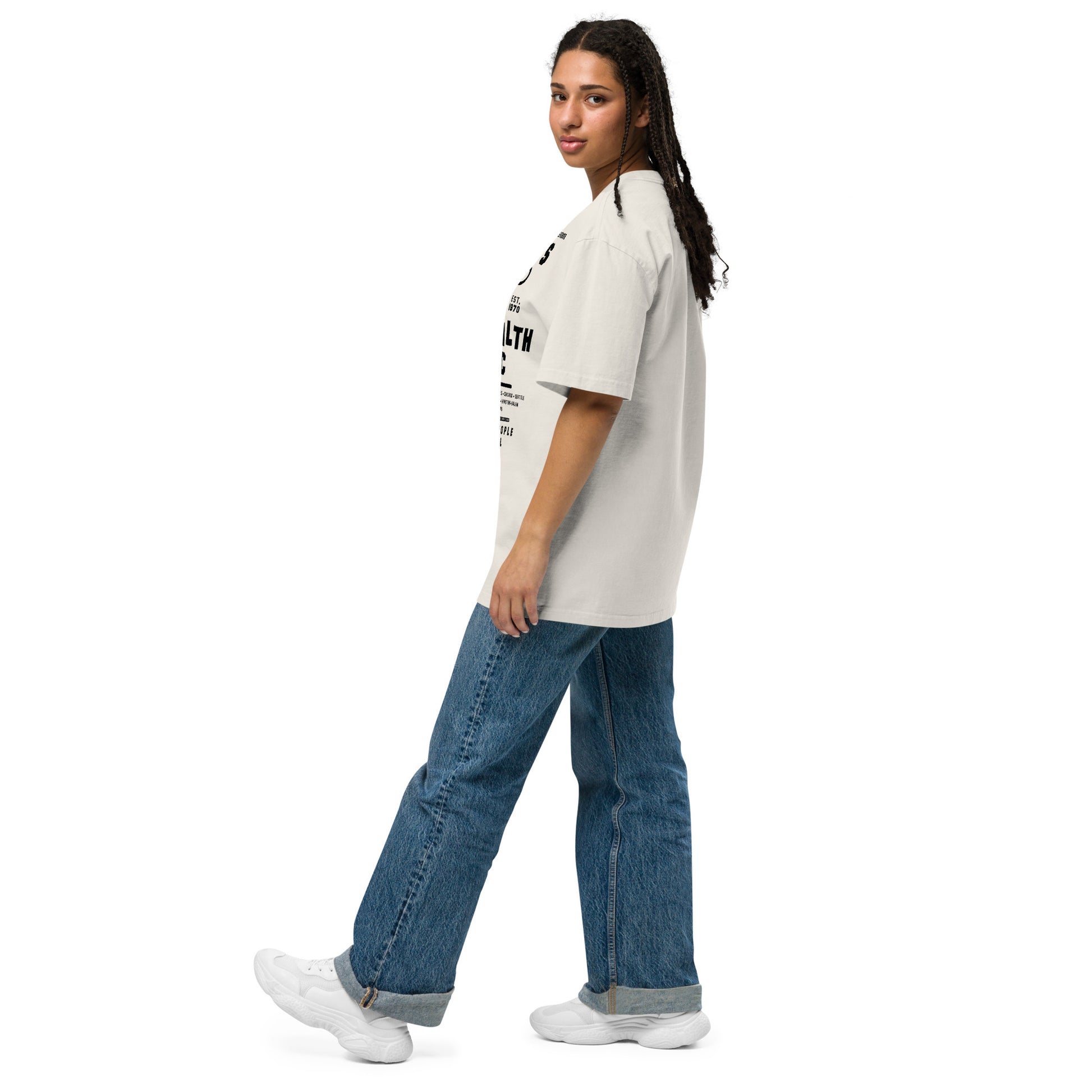 Side view of model in BPP oversized t-shirt and jeans