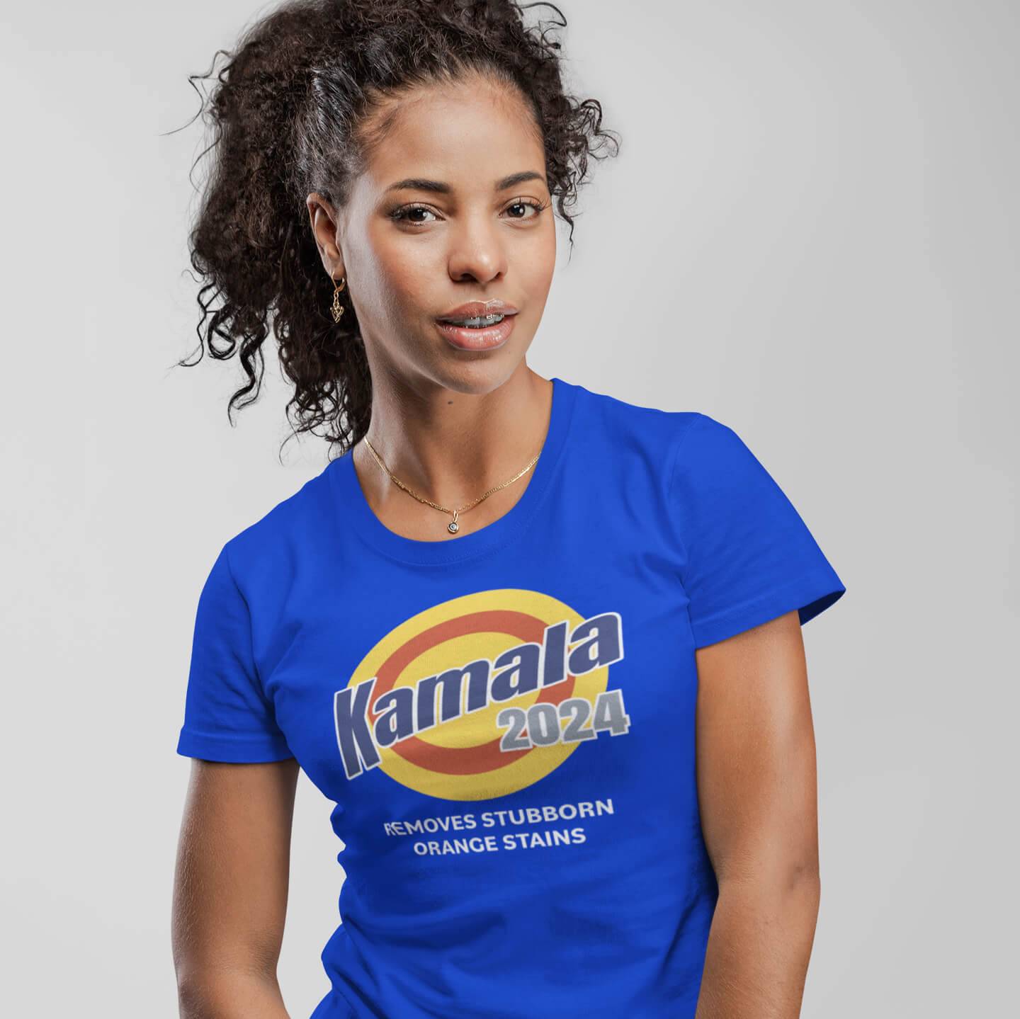 Kamala T-shirt by The Blackest Co, features vibrant kamala removes stubborn orange stains design