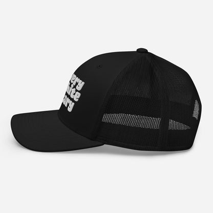 Profile view of Slavery Is White History Trucker Hat by TheBlackest Co., highlighting mesh panel and structured crown.