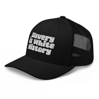 Side angle of black Slavery Is White History Trucker Hat by TheBlackest Co., showing mesh back and curved visor for breathable comfort.