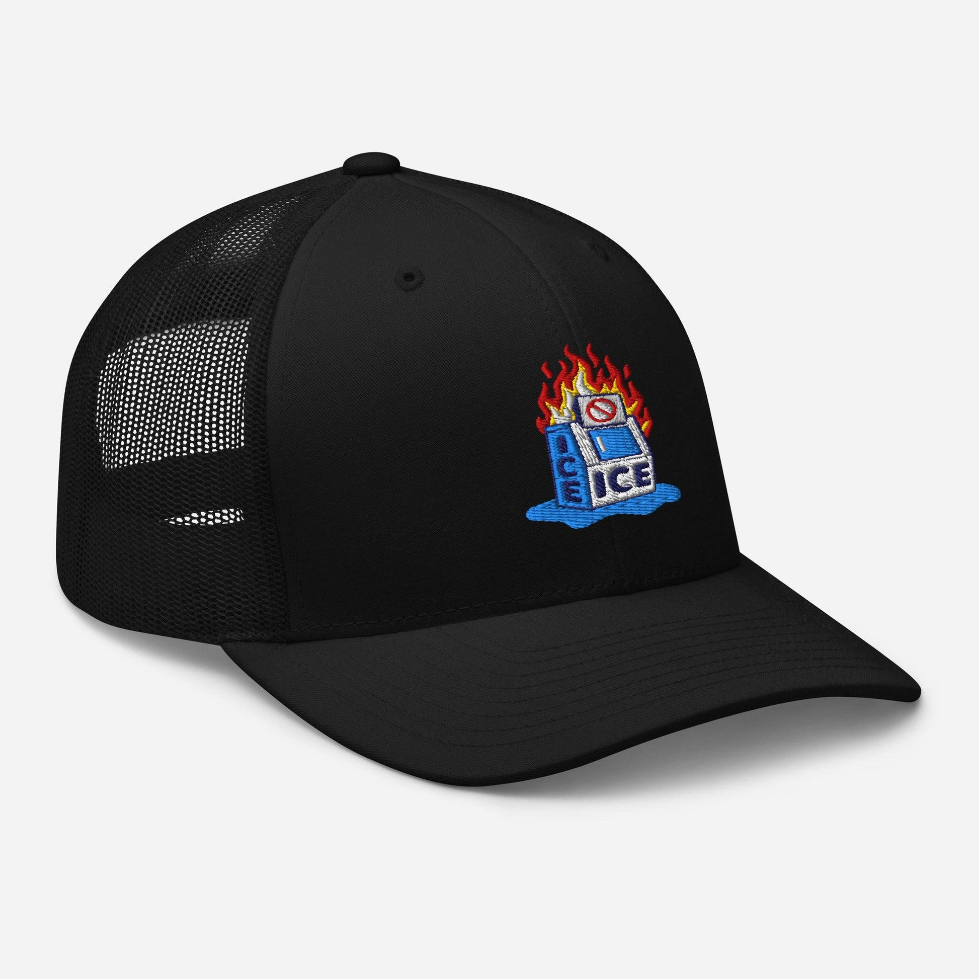 Angled view of black Abolish ICE Burning Machine Trucker Hat by TheBlackest Co., featuring embroidered flaming ice machine and mesh paneling.