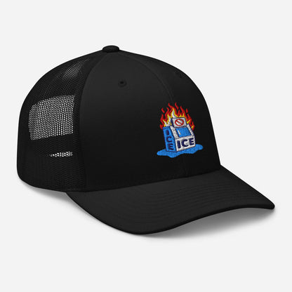 Angled view of black Abolish ICE Burning Machine Trucker Hat by TheBlackest Co., featuring embroidered flaming ice machine and mesh paneling.