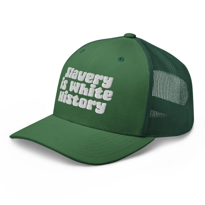 Green Slavery Is White History Trucker Hat by TheBlackest Co., statement embroidery with mesh back and curved brim.