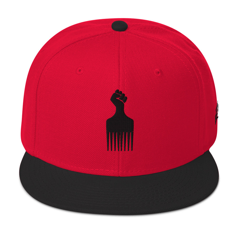 red and black snapback hat with raised fist pick and blackest co logo embroidery