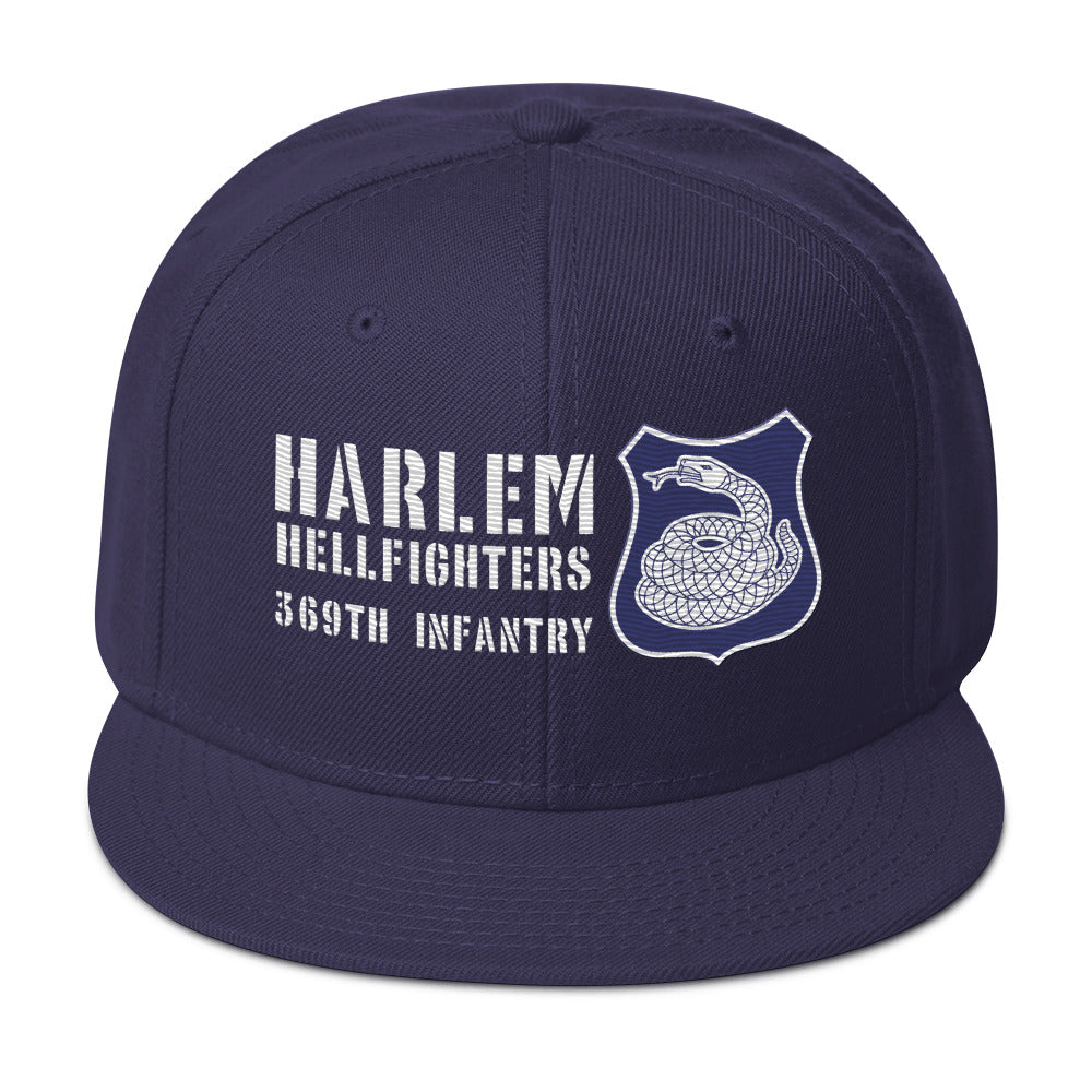 a hat with the words harlem hellfighters on it with a white and purple rattlesnake crest