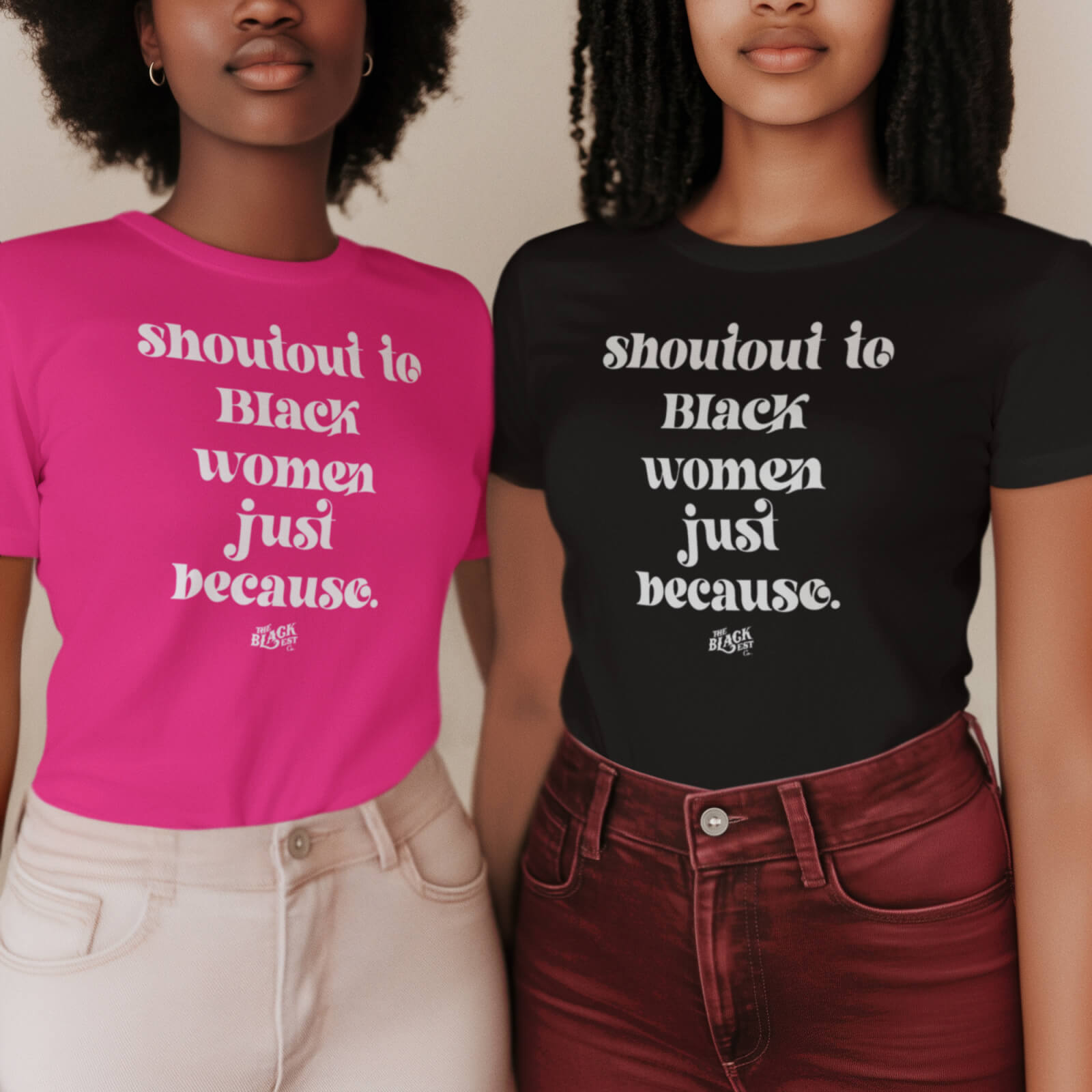Two women wearing Shoutout To Black Women Just Because Women’s Softstyle T-shirts in hot pink and black. Trendy fitted tees honoring Black women.