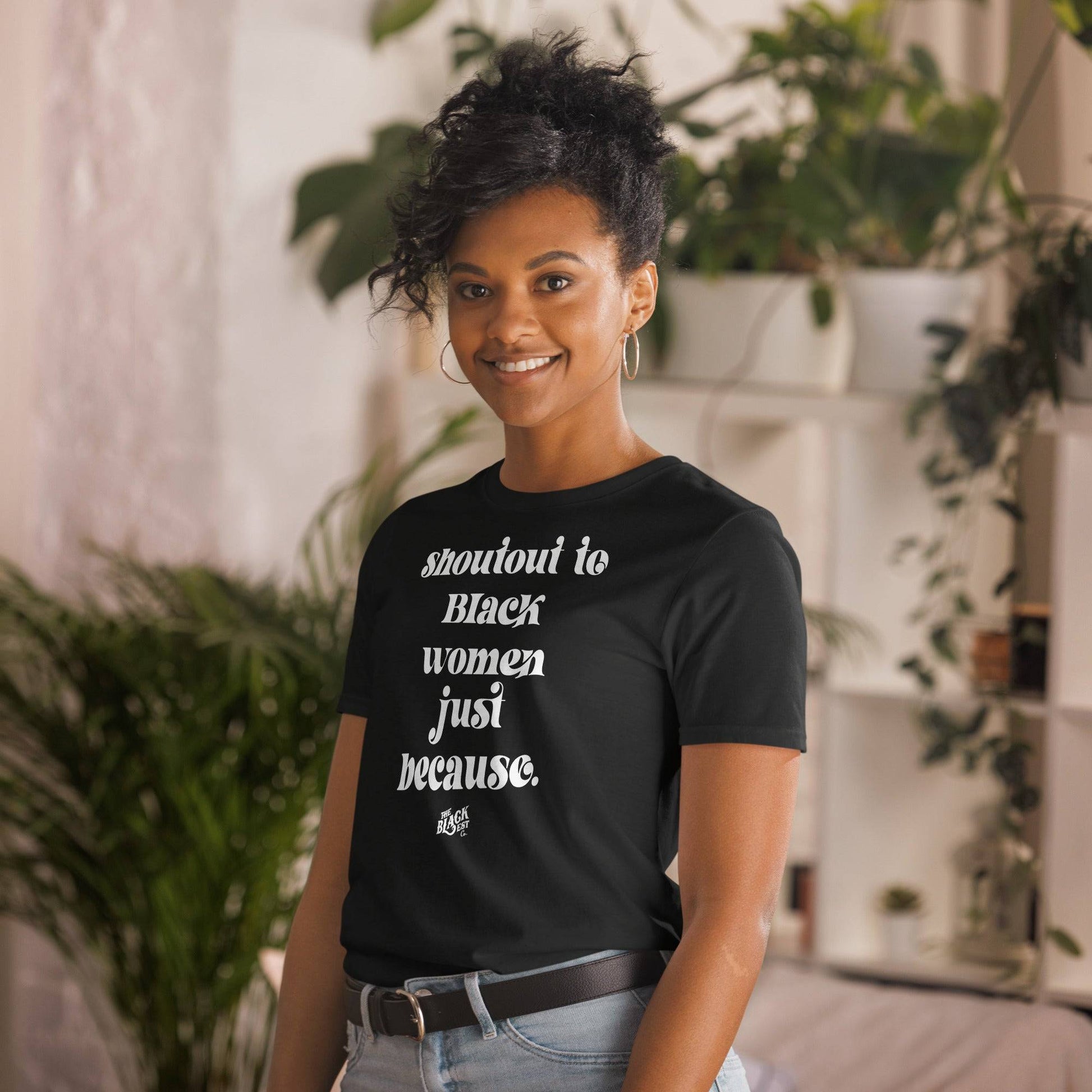a woman wearing a black t - shirt that says without to black women just because