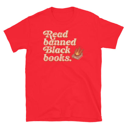 Red unisex t-shirt featuring 'Read Banned Black Books' text and a flaming book graphic, bold and eye-catching for literary activism.