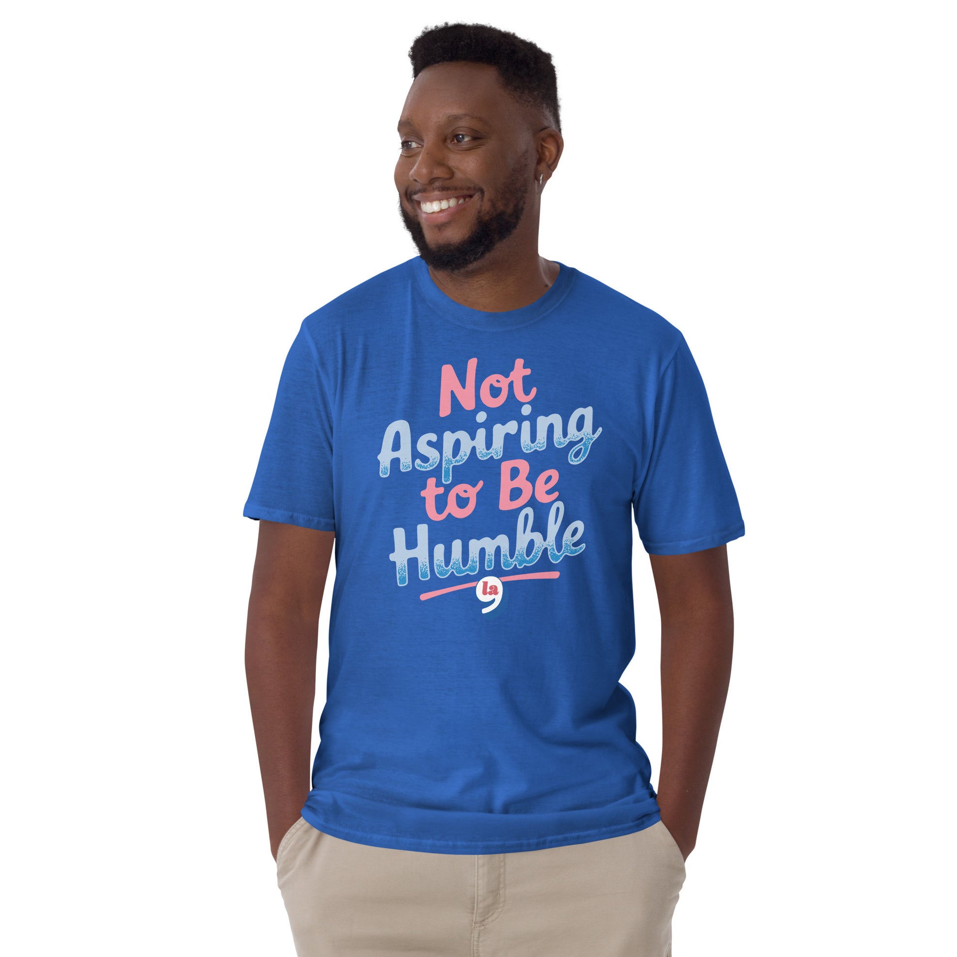 Man wearing blue 'Not Aspiring to Be Humble' t-shirt