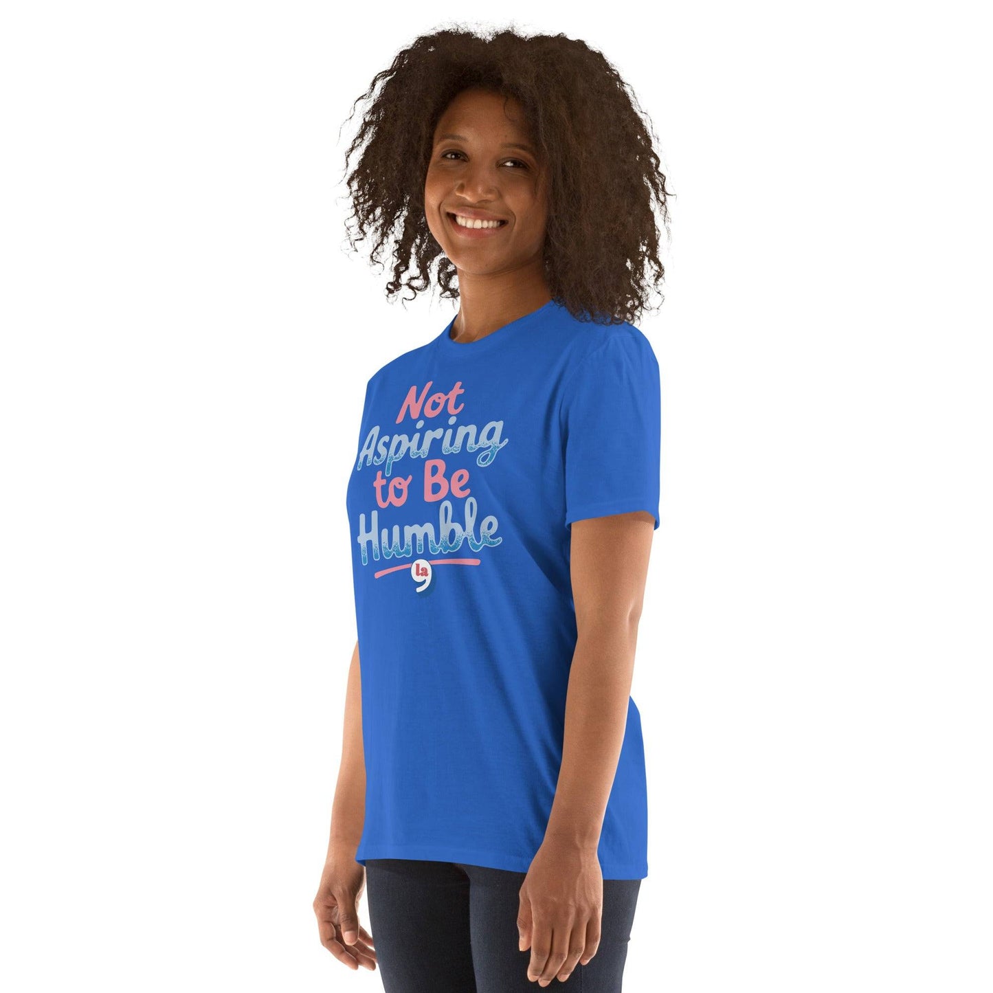 Woman wearing blue 'Not Aspiring to Be Humble' t-shirt