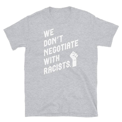 light grey t shirt with white text reading we don't negotiate with racists