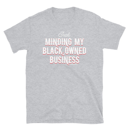 light grey t shirt with Just Minding My Black Owned Businesses design on it
