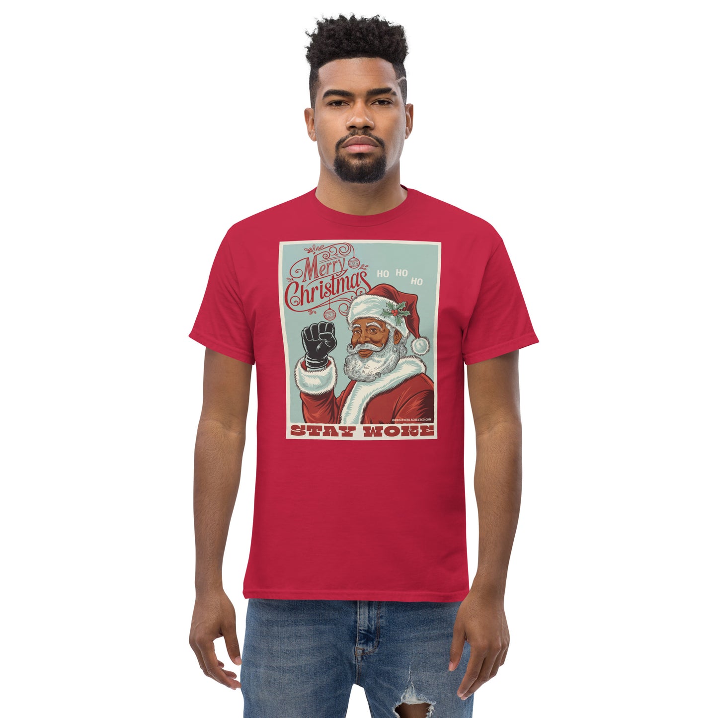 Model wearing Black Santa Stay Woke Unisex Staple T-Shirt in red, featuring bold holiday graphic and cultural message, available up to 5X.