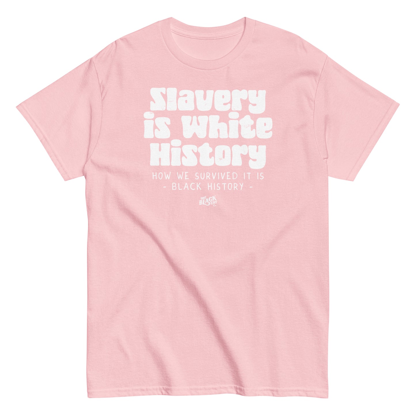 Pink unisex t-shirt with white text reading 'Slavery Is White History, How We Survived It Is Black History,' by TheBlackest Co.