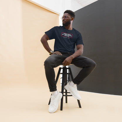 Seated model in navy 'President of The United States A Black Job' tee