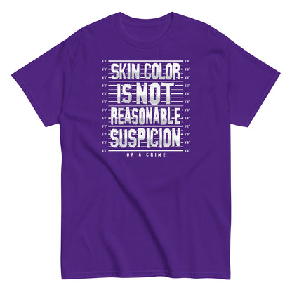 Purple unisex t-shirt with 'Skin Color Is Not Reasonable Suspicion of a Crime' text in white, supporting civil rights and equality.