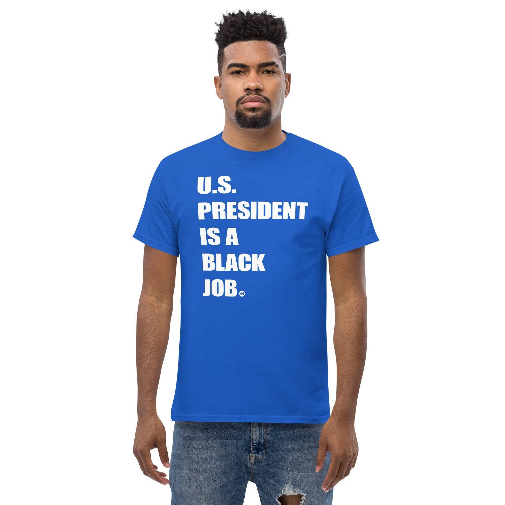 Man wearing blue 'U.S. President Is A Black Job' t-shirt