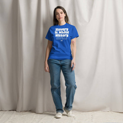 Woman standing in casual jeans and a blue t-shirt featuring the text 'Slavery Is White History, Surviving It Is Black History' by TheBlackest Co.