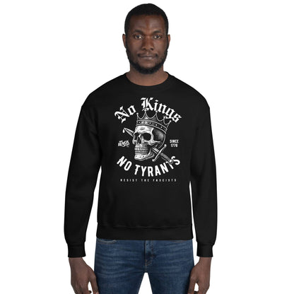 Man wearing No Kings No Tyrants Skull Protest Sweatshirt in black, showcasing bold resistance-themed streetwear by TheBlackest Co.