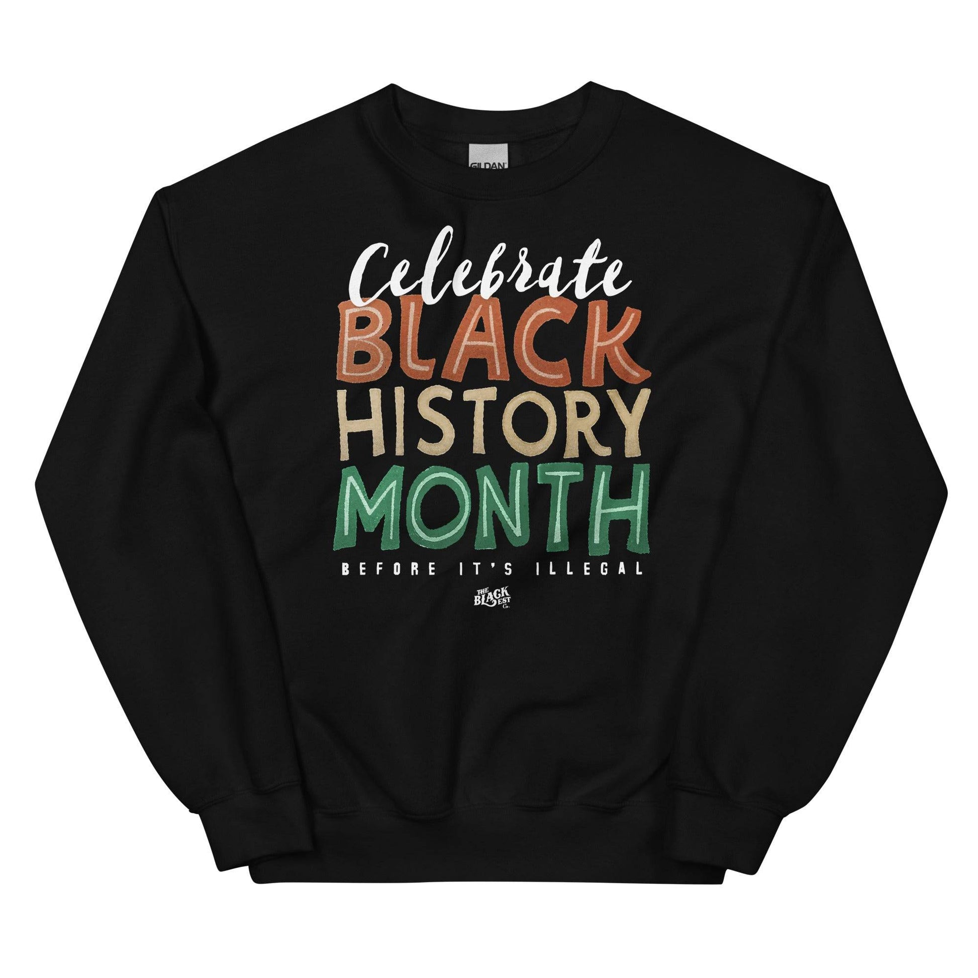 Black sweatshirt with 'Celebrate Black History Month Before It’s Illegal' text in bold multicolored lettering. Cozy unisex design for Black History Month.