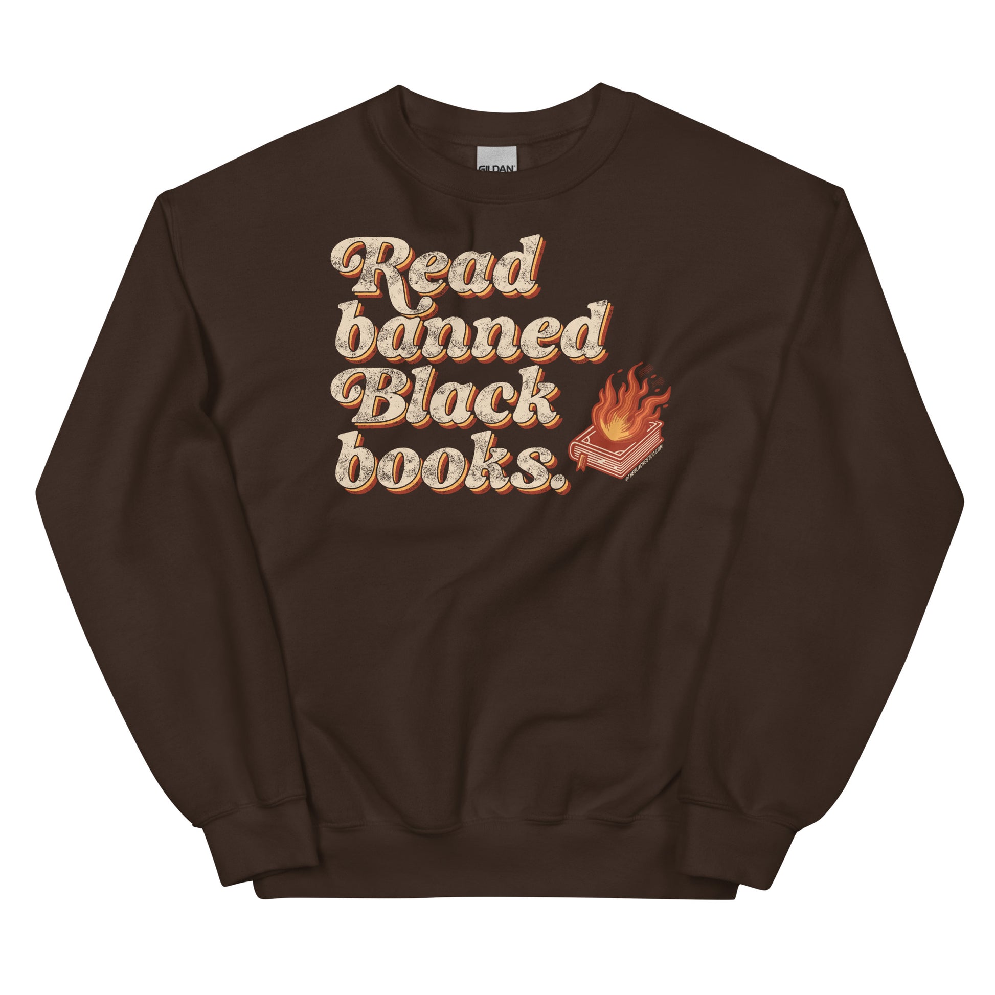 Brown unisex sweatshirt featuring 'Read Banned Black Books' text and a flaming book design, ideal for showcasing cultural pride and staying warm.