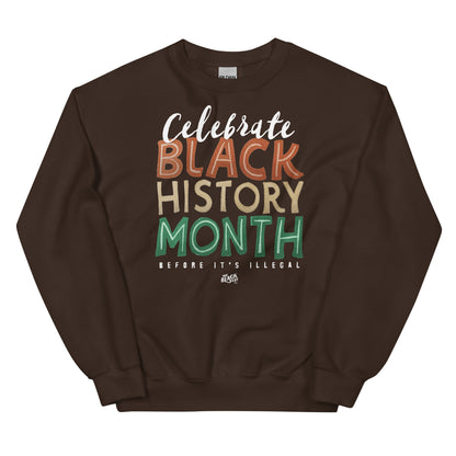 Brown sweatshirt featuring 'Celebrate Black History Month Before It’s Illegal' text in bold multicolored lettering. Cozy and stylish for any occasion.