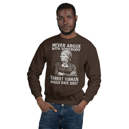 Man modeling brown Never Argue Harriet Tubman Would Have Shot Unisex Sweatshirt with strong graphic and classic crewneck style.