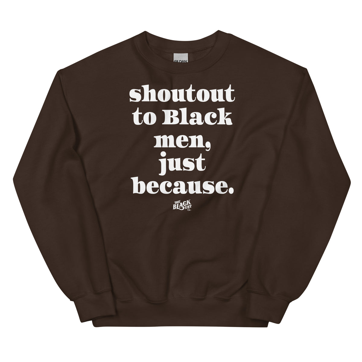 Brown sweatshirt with the same bold white message, made of comfortable cotton material, worn by a person standing outdoors.