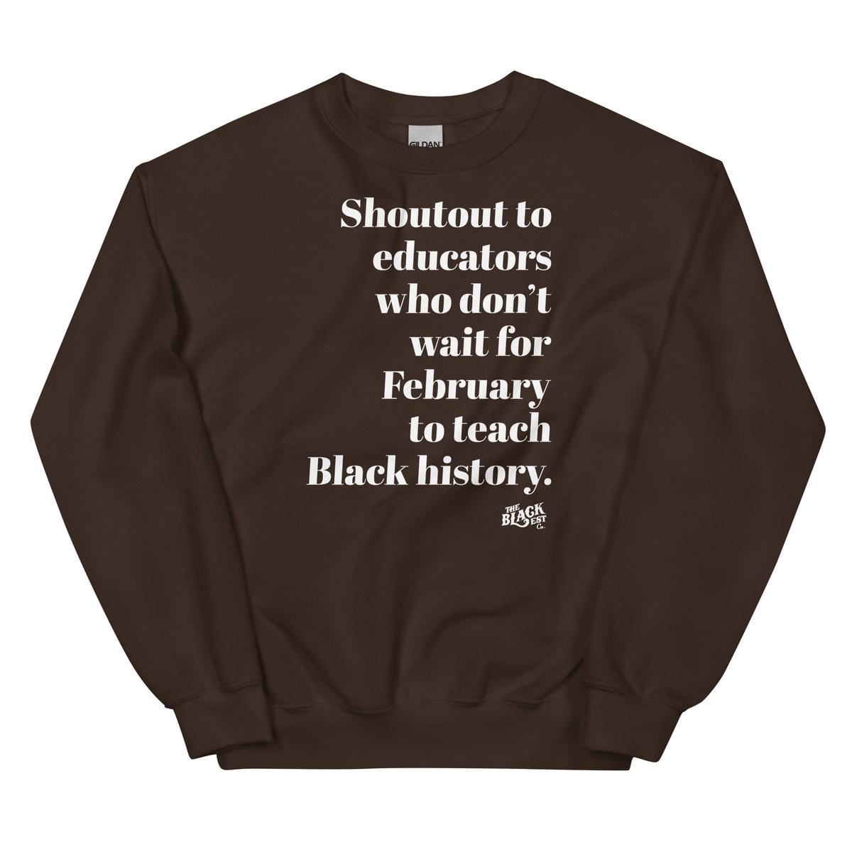 Brown sweatshirt with white text 'Shoutout to educators who don't wait for Black history,' made of soft cotton, displayed on a flat surface.
