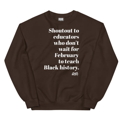 Brown sweatshirt with white text 'Shoutout to educators who don't wait for Black history,' made of soft cotton, displayed on a flat surface.