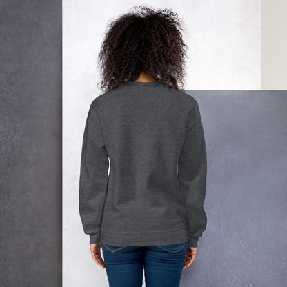 woman showing back of dark grey sweatshirt with white text reading harlem hellfighters