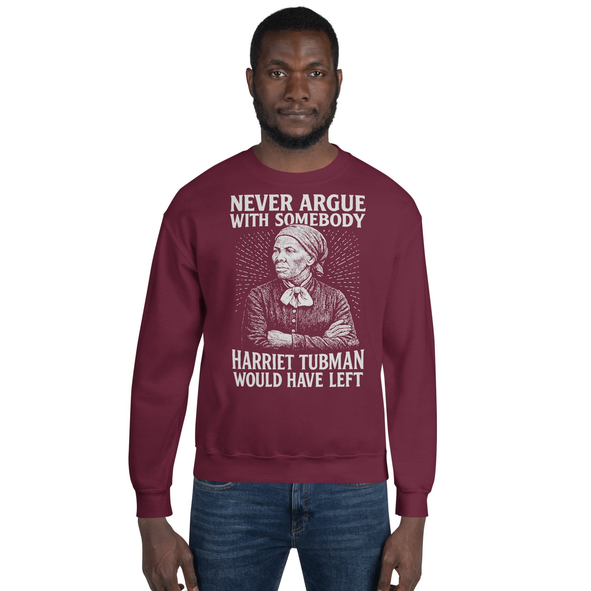 Man modeling maroon unisex crewneck sweatshirt featuring Harriet Tubman graphic and strong statement text for Black history pride.