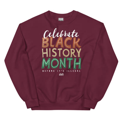 Maroon sweatshirt with 'Celebrate Black History Month Before It’s Illegal' text in bold multicolored lettering. Designed for comfort and style.