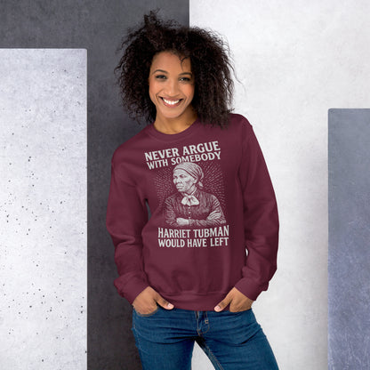 Smiling woman in maroon 'Never Argue Harriet Tubman Would Have Left' sweatshirt, styled casually with jeans for bold statement wear.