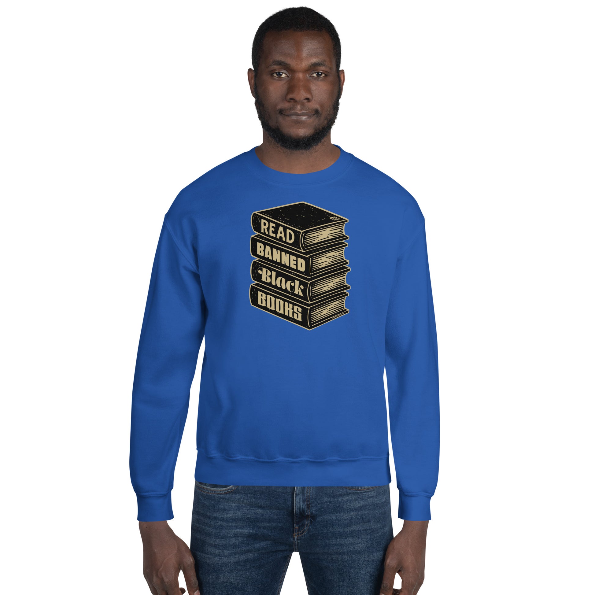 Man modeling Read Banned Black Books unisex crewneck sweatshirt in royal blue, featuring bold graphic for educational advocacy.