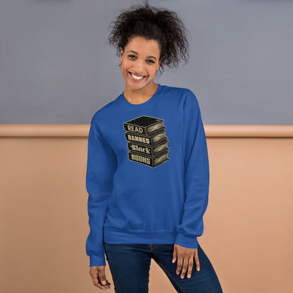 Model wearing Read Banned Black Books unisex crewneck sweatshirt in royal blue, ideal for activism and cold weather fashion.