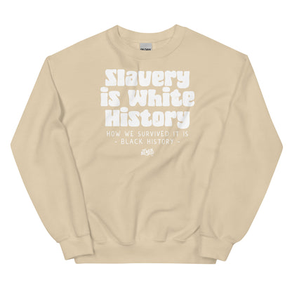 Beige unisex sweatshirt with bold white text 'Slavery Is White History, How We Survived It Is Black History' by TheBlackest Co.