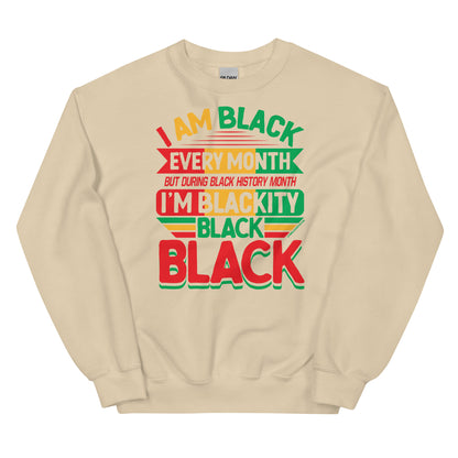 Blackity Black Black History Month Sweatshirt by TheBlackest Co in sand with bold red, green, and yellow text design celebrating Black pride.