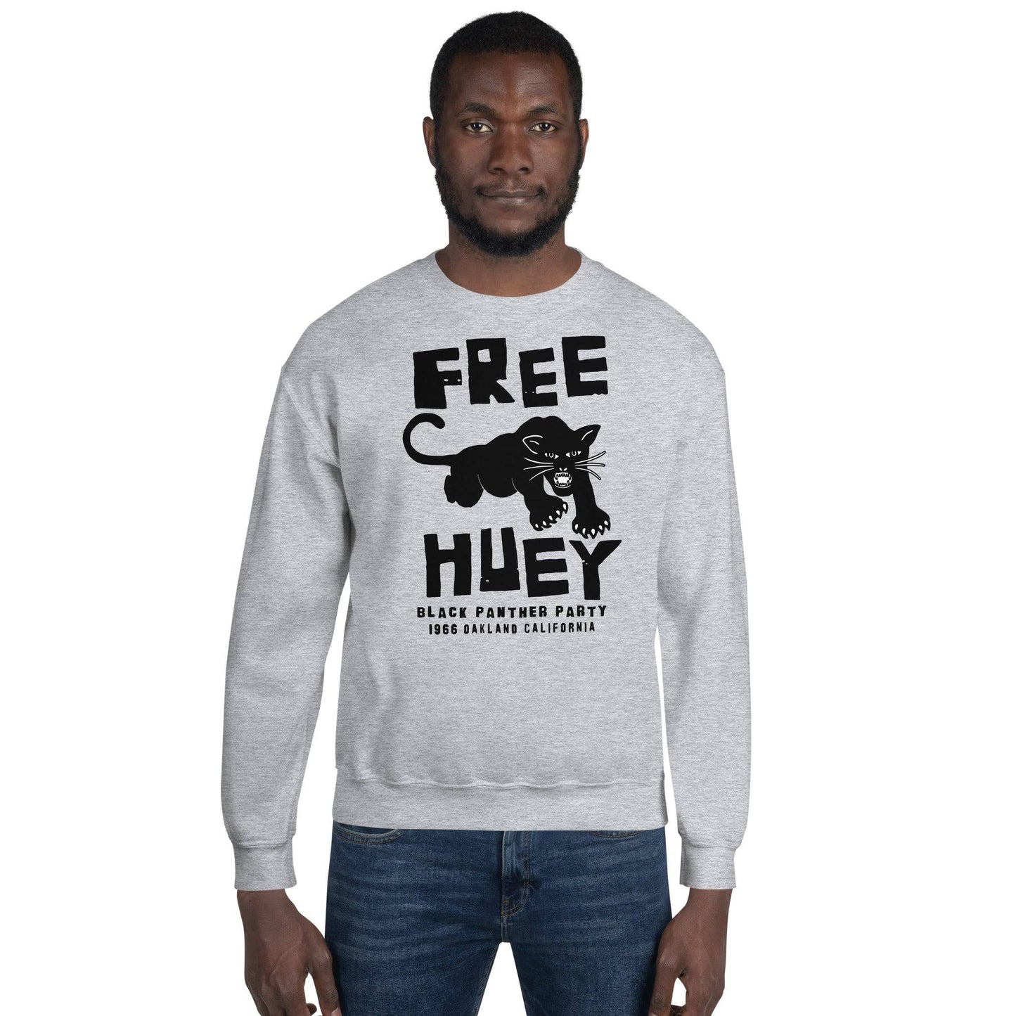 a man wearing a free huey sweatshirt