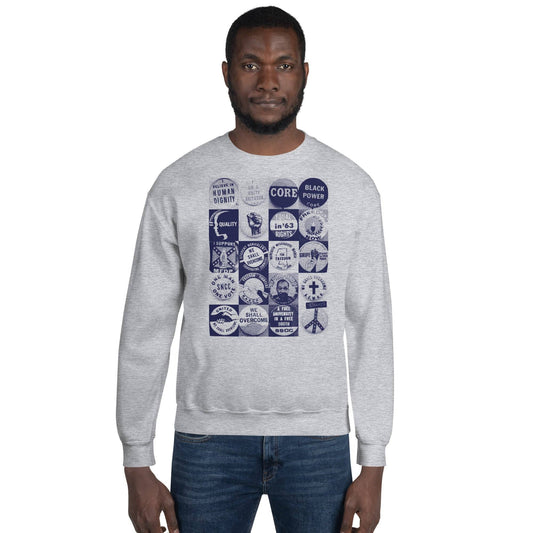 a man wearing a grey sweatshirt with blue civil rights buttons graphics images on it