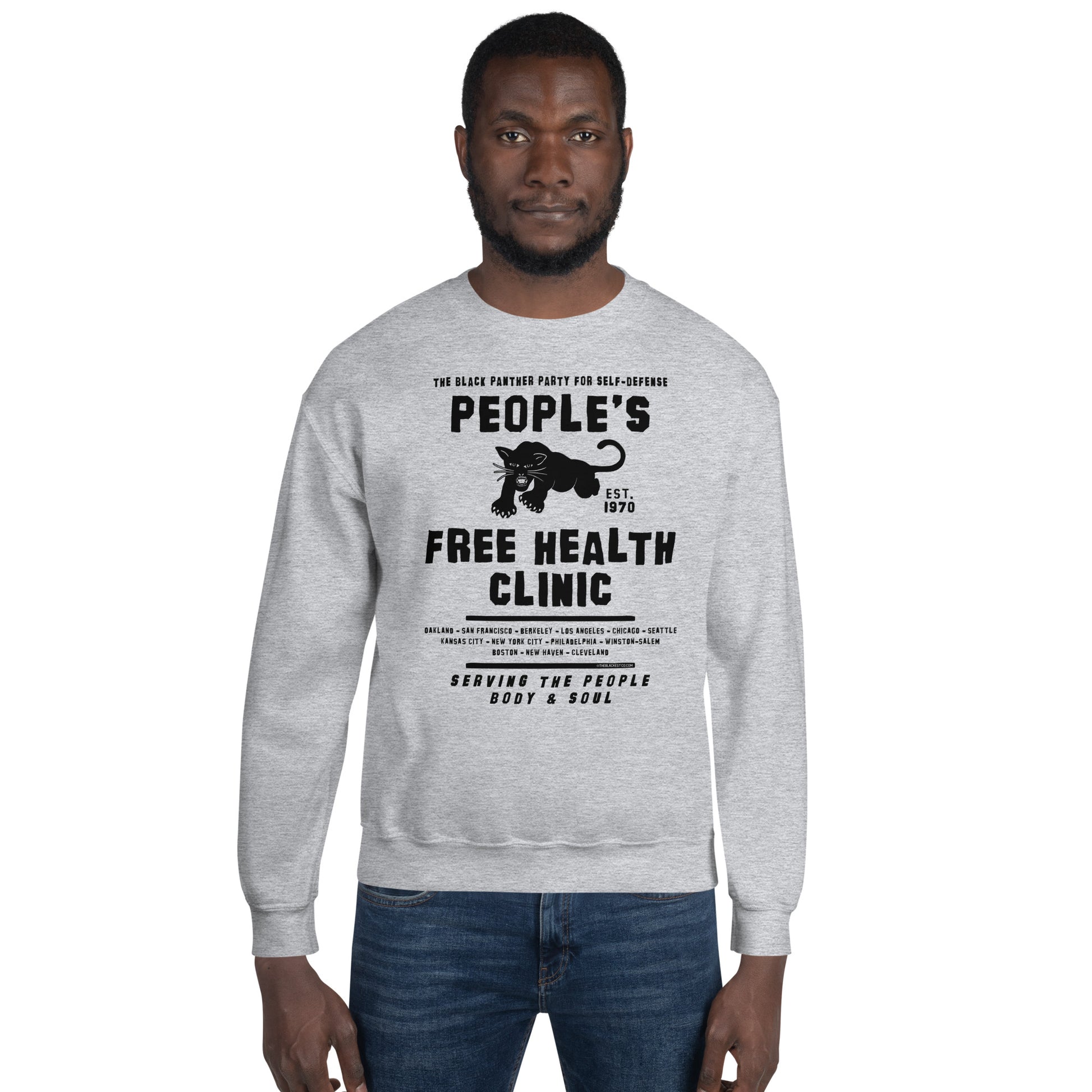 Man wearing gray People's Free Health Clinic sweatshirt