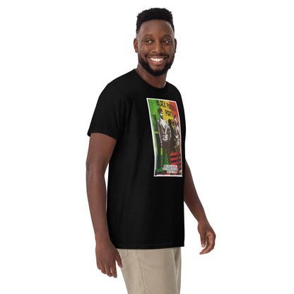 Man wearing Black Panthers T-shirt in black, side view