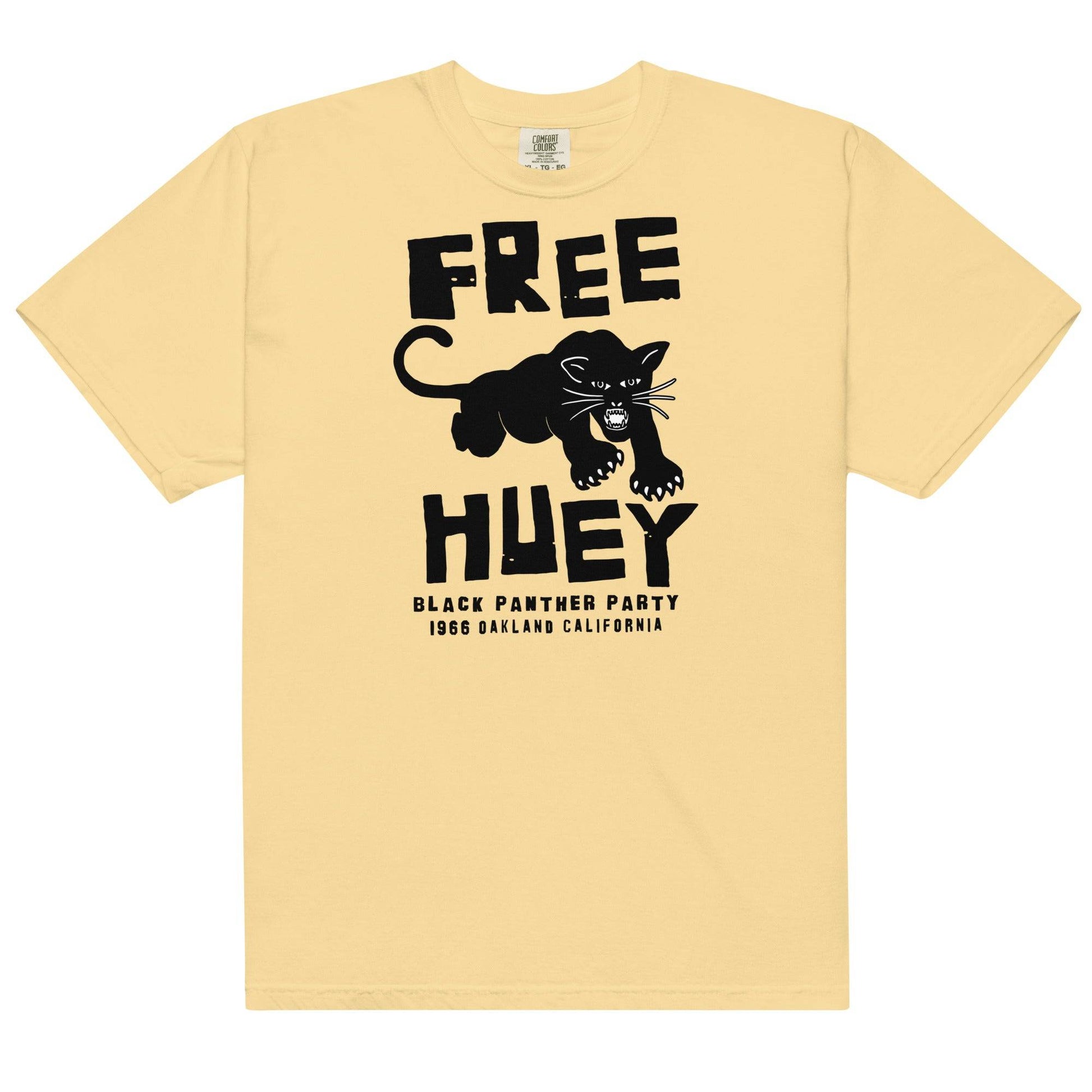a yellow t - shirt with a black panther on it and says free huey