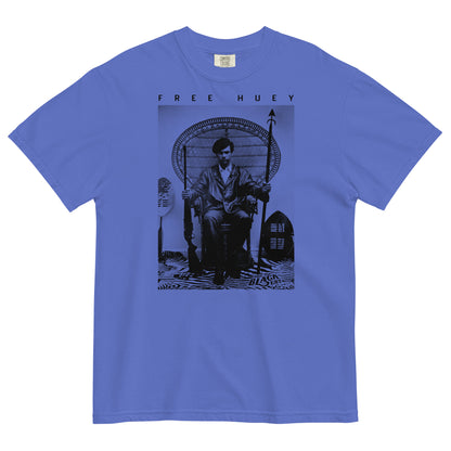 an ice blue t shirt with a picture of huey p newton sitting on a wicker chair