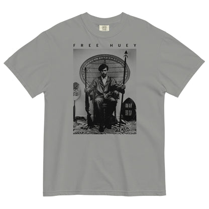 a grey t shirt with a picture of huey p newton sitting on a wicker chair